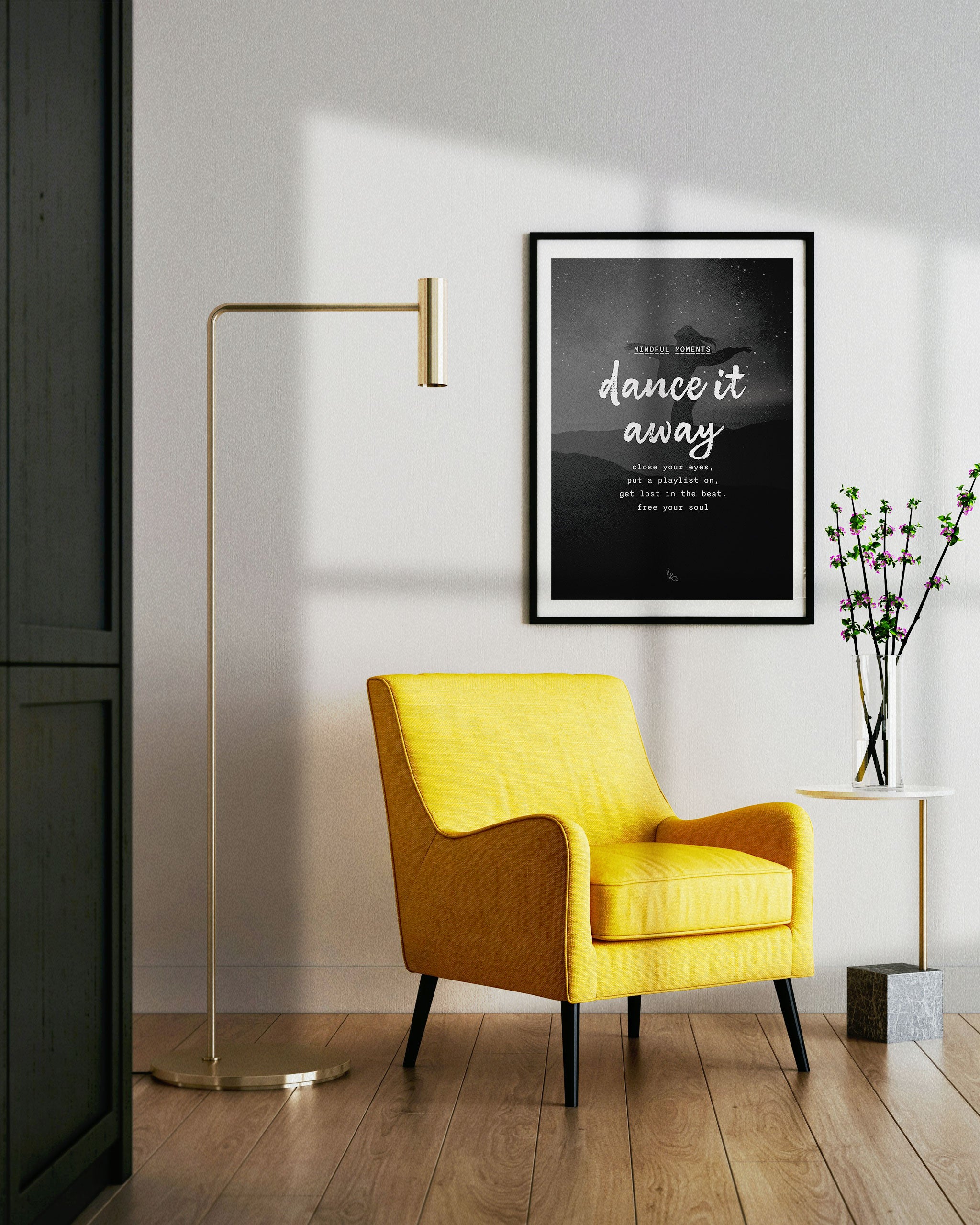 minimalist wall art for dancers shown above a yellow sofa in a simple frame