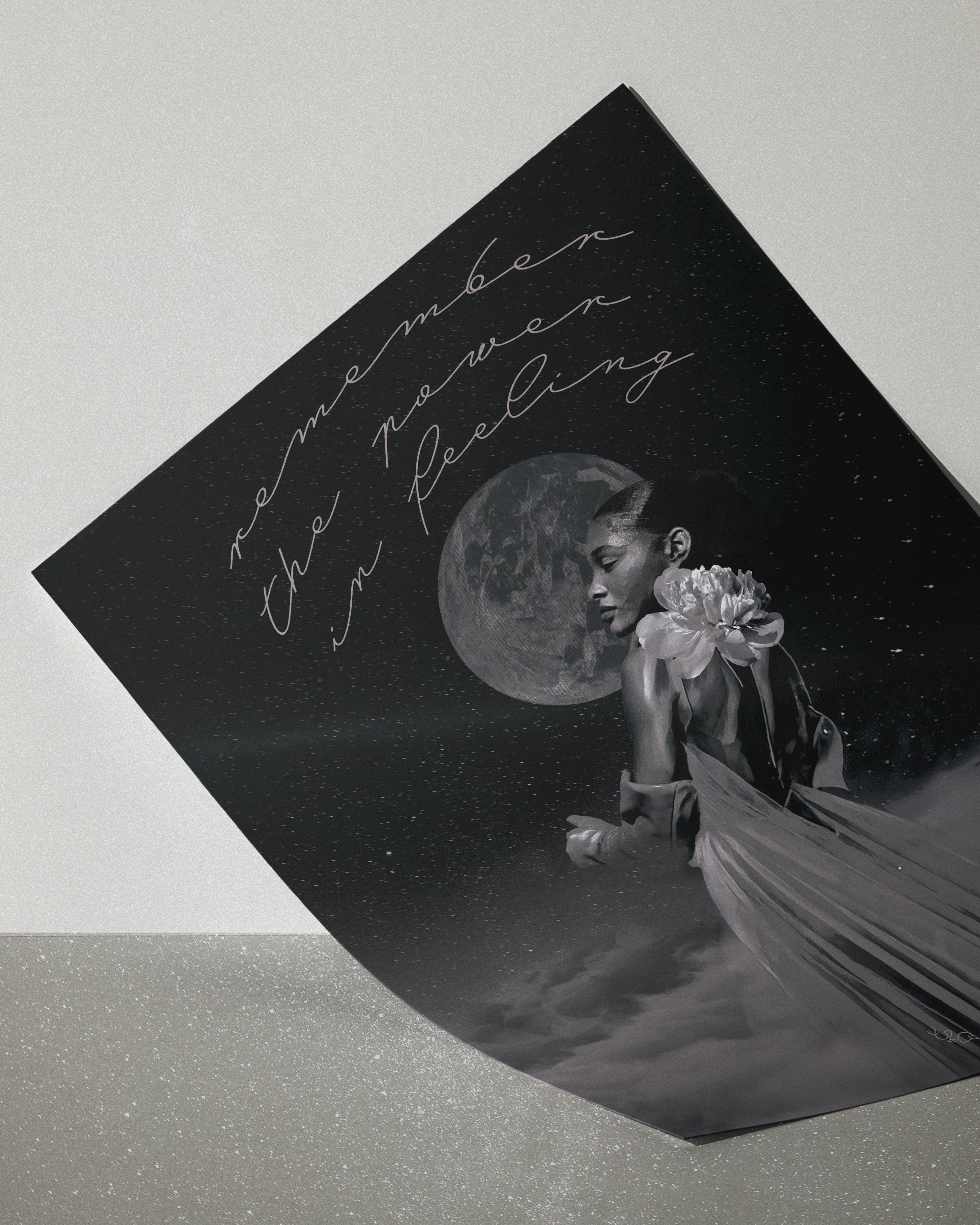 black white and grey wall art of a gentle empath: a woman, moon, and floral elements on a dark background.