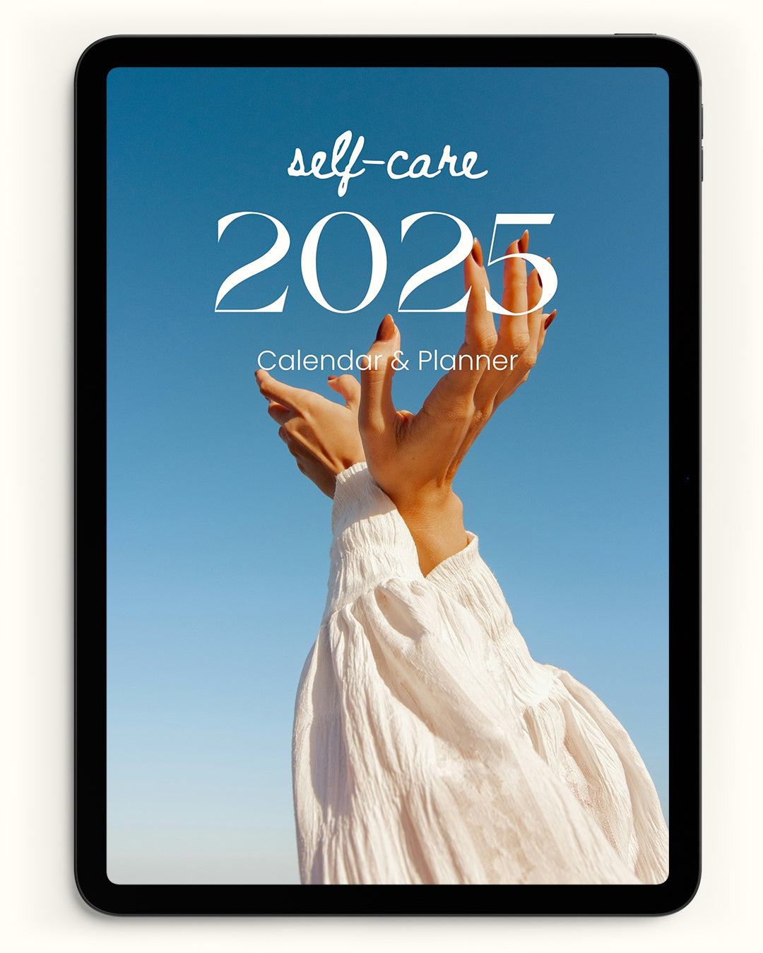 the digital photo self care 2025 calendar shown on an ipad device