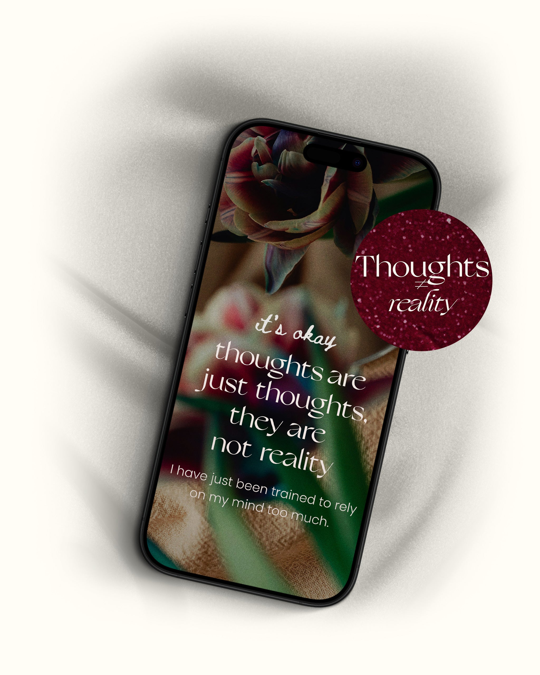 thoughts are not reality wallpaper displayed on an iphone screen