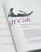 Open self care journal with an illustration of a figure lying and the word 'Break' in purple text.