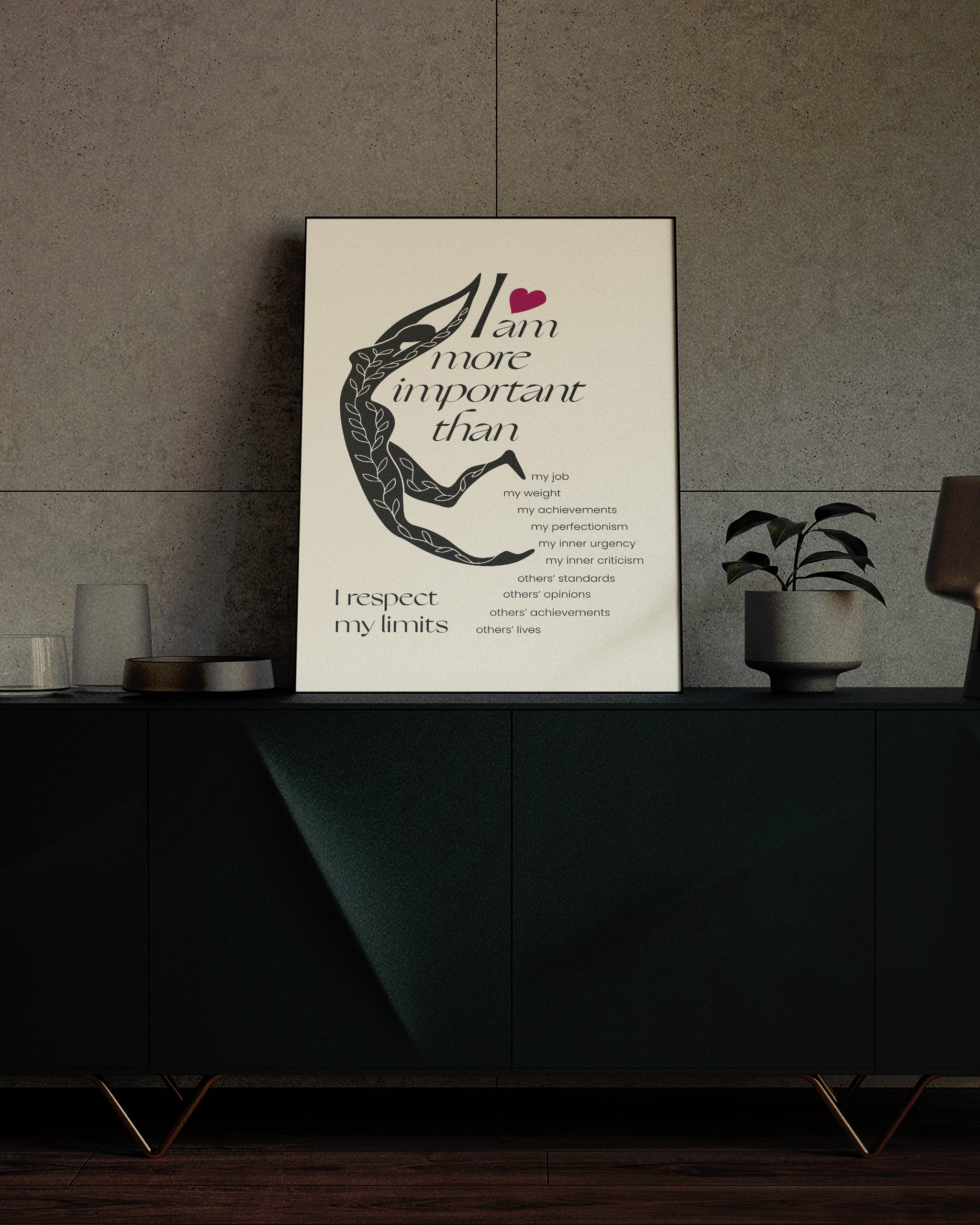 self love affirmations poster for perfectionism framed in a black frame and shown on a emerald desk