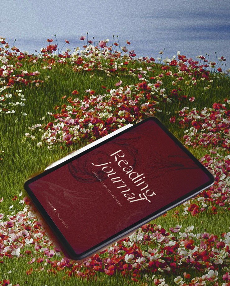 the zen acrobat book lovers collection represented by the digital reading journal on an ipad on a flowery meadow